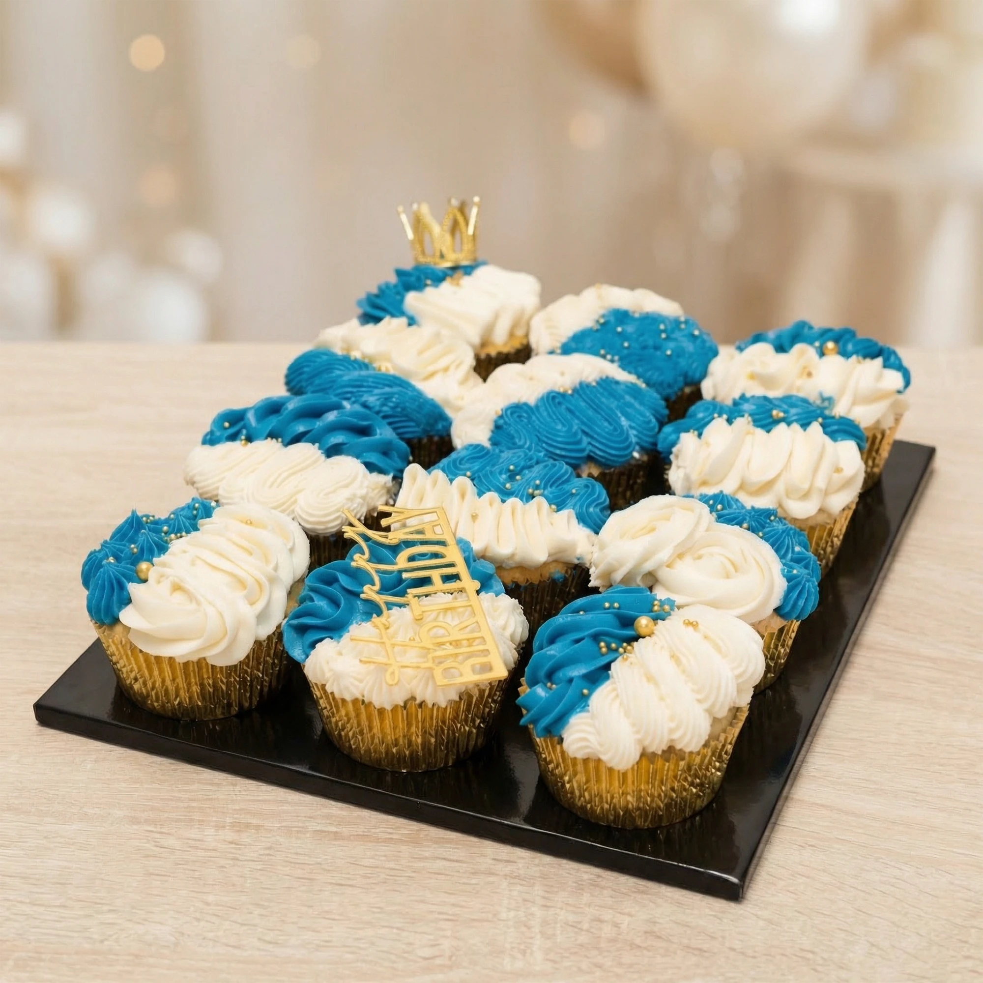 Elegant 12 cupcake bouquet in The Bahamas with gold topper and buttercream icing